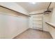 Bright walk-in closet with shelving and hanging rods at 23 Antero Dr, Henderson, NV 89074