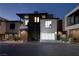 Modern home with attached garage and sleek design at 601 Overlook Rim Dr, Henderson, NV 89012