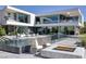 Luxury home with a pool and a fire pit; modern architecture at 13 Rockstream Dr, Henderson, NV 89012