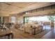 Bright living room with sliding doors to a patio at 13 Rockstream Dr, Henderson, NV 89012