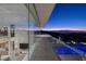 Modern balcony overlooking city lights at night at 13 Rockstream Dr, Henderson, NV 89012