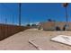 Backyard view of home with additional concrete slab at 1312 Denarius Cir, Las Vegas, NV 89101