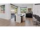 Modern dining area with sliding doors leading to a backyard patio at 3038 Villanelle Ave, Las Vegas, NV 89044