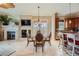 Bright dining area with glass table and access to a patio at 18 Via Visione # 106, Henderson, NV 89011