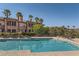 Inviting community swimming pool with lounge chairs at 18 Via Visione # 106, Henderson, NV 89011