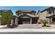 Two-story house with a two-car garage at 246 Polaris Ridge Ave, Henderson, NV 89011