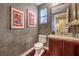 Stylish powder room with modern vanity and toilet at 9205 Tesoras Dr # 401, Las Vegas, NV 89144