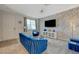 Living area featuring blue velvet sofa and gray walls at 25 Barbara Ln # 67, Las Vegas, NV 89183