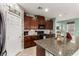 Spacious kitchen with granite countertops, stainless steel appliances, and ample cabinetry at 9271 Keystone Ridge Ave, Las Vegas, NV 89148