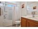 Clean bathroom with shower/tub combo and vanity at 9785 Iron Mine St, Las Vegas, NV 89183