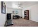 Spacious bedroom with home gym and bookcase at 9785 Iron Mine St, Las Vegas, NV 89183