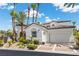 Stunning two-story home with white stucco exterior and tile roof at 11 Caminito Amore, Henderson, NV 89011