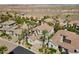 Aerial view of a luxury community showcasing upscale homes with desert landscape at 11 Caminito Amore, Henderson, NV 89011