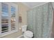 Clean bathroom with a shower/tub combo and a window at 1841 Indian Bend Dr, Henderson, NV 89074