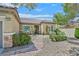 Single-story home with a welcoming entryway and landscaped front yard at 2369 Wisconsin Dells Dr, Henderson, NV 89044