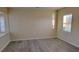 Bright living room featuring hardwood floors and large window at 1101 W Basin Ave, Pahrump, NV 89060