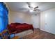 Serene bedroom with a comfortable bed and ceiling fan at 4555 E Sahara Ave # 276, Las Vegas, NV 89104