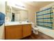 Clean bathroom, shower/tub combo, wood flooring, and wood vanity at 4555 E Sahara Ave # 276, Las Vegas, NV 89104