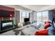 Modern living room with fireplace and city views at 4381 W Flamingo Rd # 3021, Las Vegas, NV 89103