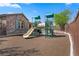 Community playground with playset and rubberized surface at 10928 Mount Stellar St, Las Vegas, NV 89179