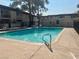 Refreshing community swimming pool with surrounding patio at 5362 Swenson St # 43, Las Vegas, NV 89119