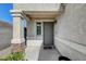 Front door entrance with a covered porch at 3264 Sutters Fort St, North Las Vegas, NV 89032