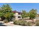 Community courtyard with trees, picnic table, and landscaping at 5370 Swenson St # 47, Las Vegas, NV 89119