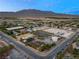 Aerial view of expansive equestrian estate with multiple buildings at 8664 Guy Ave, Las Vegas, NV 89143