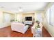 Living room with hardwood floors, large TV, and comfy sofas at 2795 Murray Hill Ln, Las Vegas, NV 89142