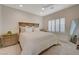 Spacious main bedroom with wood furniture and window shutters at 1450 Pink Dawn Dr, Henderson, NV 89014