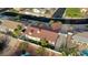 Aerial view of a house with a red tile roof and a yard at 928 Rhyolite Ter, Henderson, NV 89011