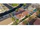 Aerial view of a single Gathering home with tile roof and lush landscaping at 928 Rhyolite Ter, Henderson, NV 89011