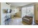 Living Room with sofas and a view into the kitchen at 230 E Flamingo Rd # 402, Las Vegas, NV 89169