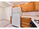 Bright kitchen with wood cabinets and tiled countertops at 1751 E Reno Ave # 132, Las Vegas, NV 89119