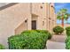 Condo building exterior showcasing a walkway and landscaping at 1751 E Reno Ave # 132, Las Vegas, NV 89119