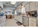 Eat-in kitchen with white cabinets and stainless steel appliances at 1009 Ironwood Dr, Las Vegas, NV 89108