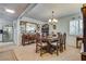 Spacious dining room with antique furniture and chandelier at 1009 Ironwood Dr, Las Vegas, NV 89108