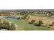 View of the lush green golf course adjacent to the community at 7365 Mission Hills Dr, Las Vegas, NV 89113