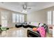 Relaxing living room with sectional sofa and plenty of natural light at 10851 Piccata St, Las Vegas, NV 89141