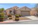 Charming single-story home with a landscaped front yard at 6736 Arctic Breeze St, North Las Vegas, NV 89084