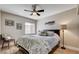 Spacious bedroom with ceiling fan, and wood-look floors at 640 Badlands Ave, Henderson, NV 89012