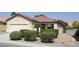 Single story house with a two car garage at 3418 Cinnamon Creek Ave, North Las Vegas, NV 89031