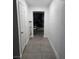 Clean hallway with tile floor and access to rooms at 1308 Harriet St, Las Vegas, NV 89101