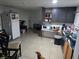 Kitchen with appliances, cabinets, and tile floor at 1308 Harriet St, Las Vegas, NV 89101