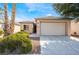 Single story home with attached garage at 8916 El Diablo St, Las Vegas, NV 89131