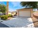 One story home with attached garage and driveway at 8916 El Diablo St, Las Vegas, NV 89131