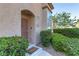 Townhome exterior with front door and landscaping at 1516 Faldo St # 1516, Las Vegas, NV 89128