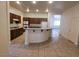 Large kitchen with an island and ample cabinet space at 8240 Aurora Peak Ave, Las Vegas, NV 89131