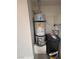 Laundry room with water heater and water softener at 1890 Eagle Flight Ln, Henderson, NV 89012