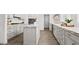 Modern kitchen with white cabinets and marble countertops at 1890 Eagle Flight Ln, Henderson, NV 89012